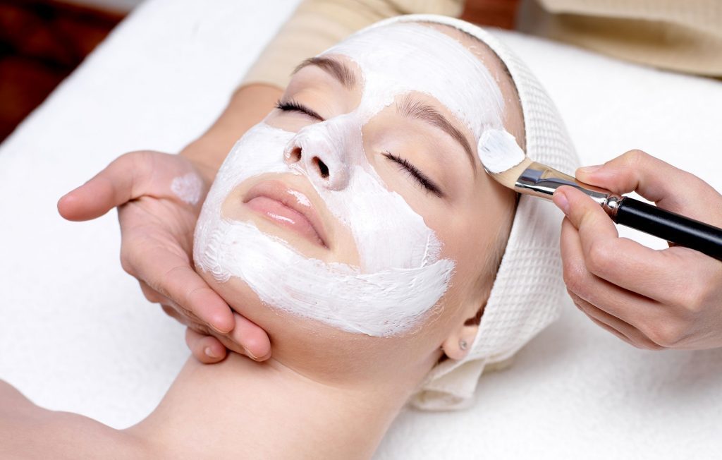 Woman-having-facial-mask-at-beauty-salon-133557705_3645x2734